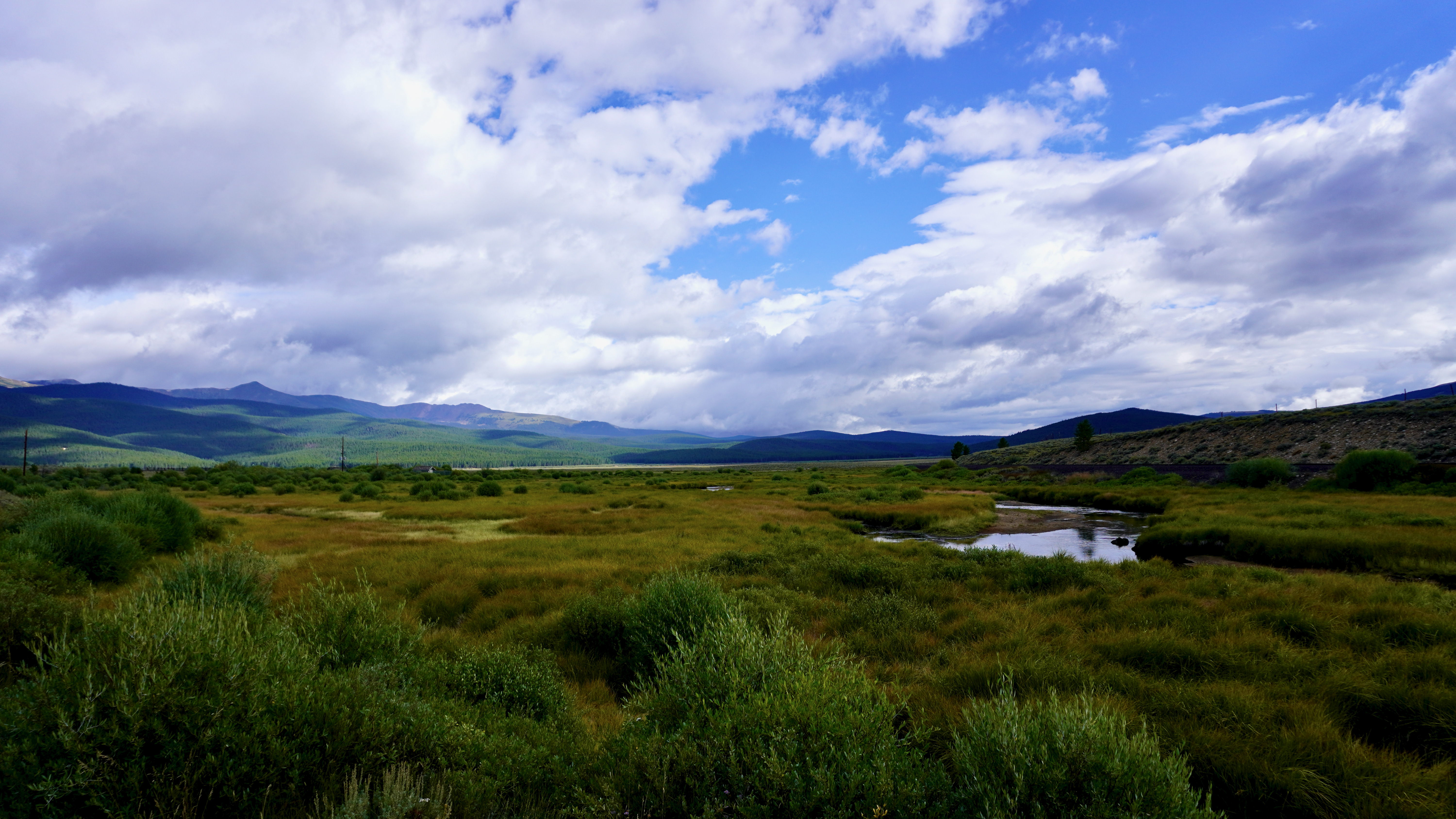 the tennessee creek valley and mountains in the background