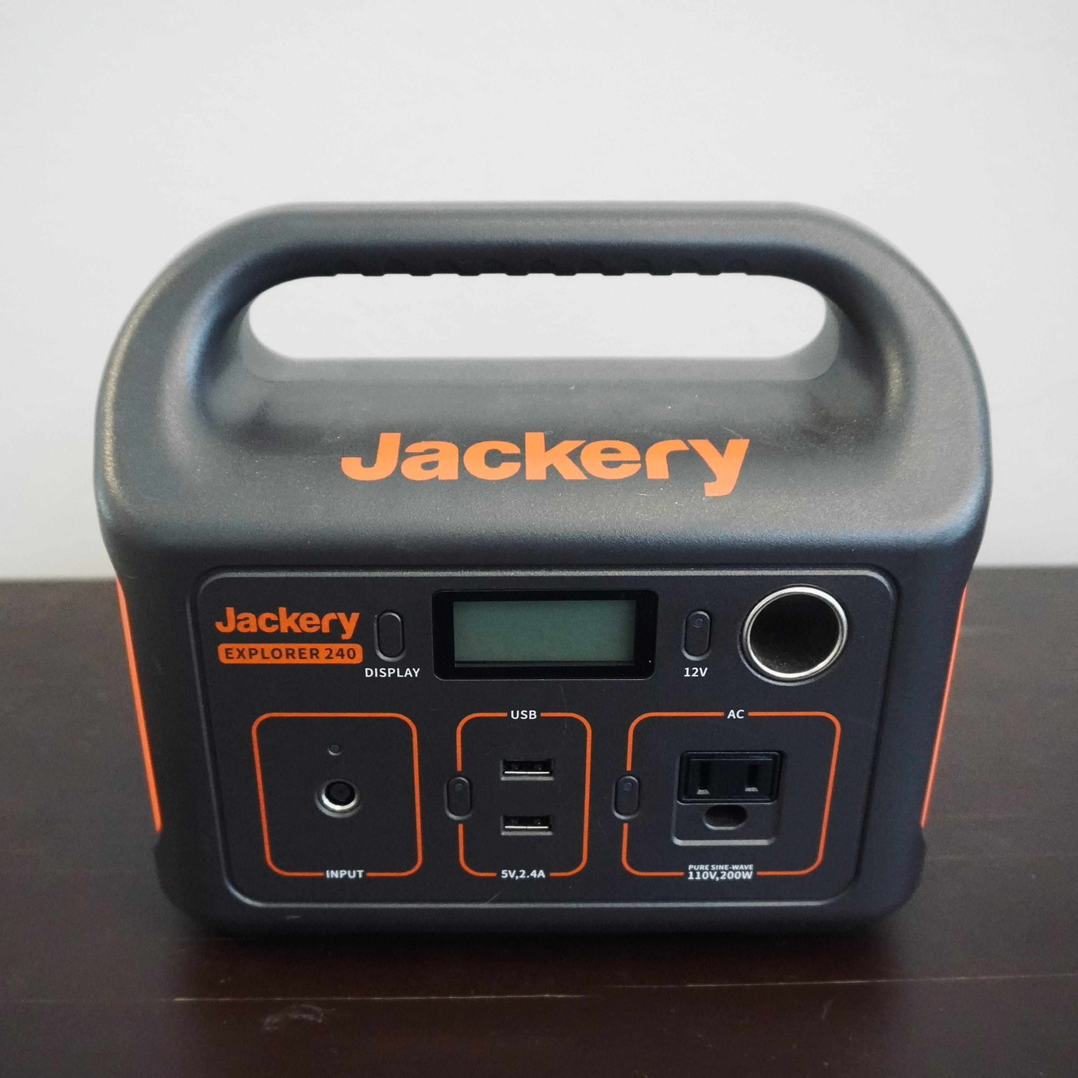 the front of the jackery 240 watt batter pack 2021 camping gear review