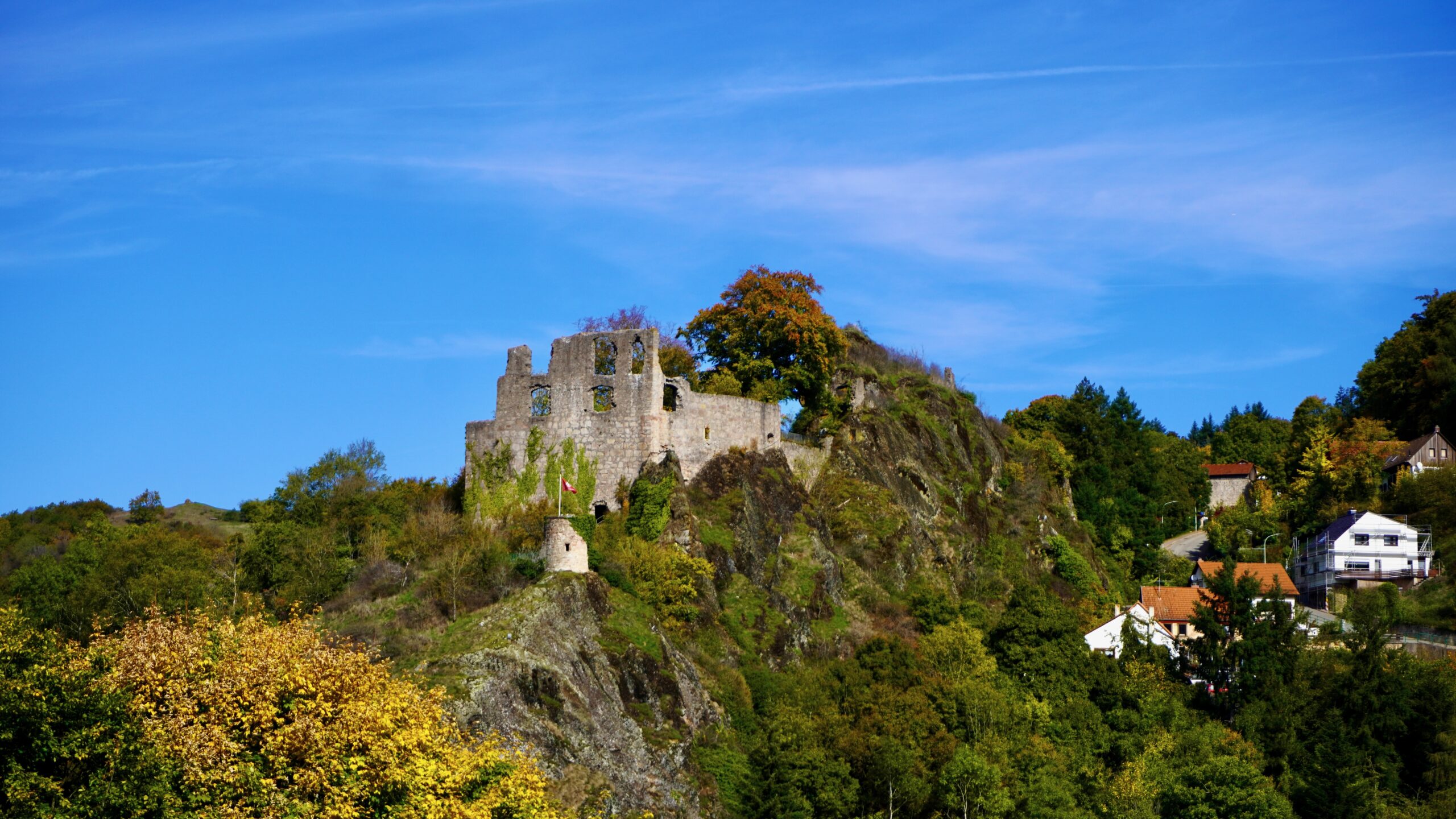 the walls and tower with town below at falkenstein germany