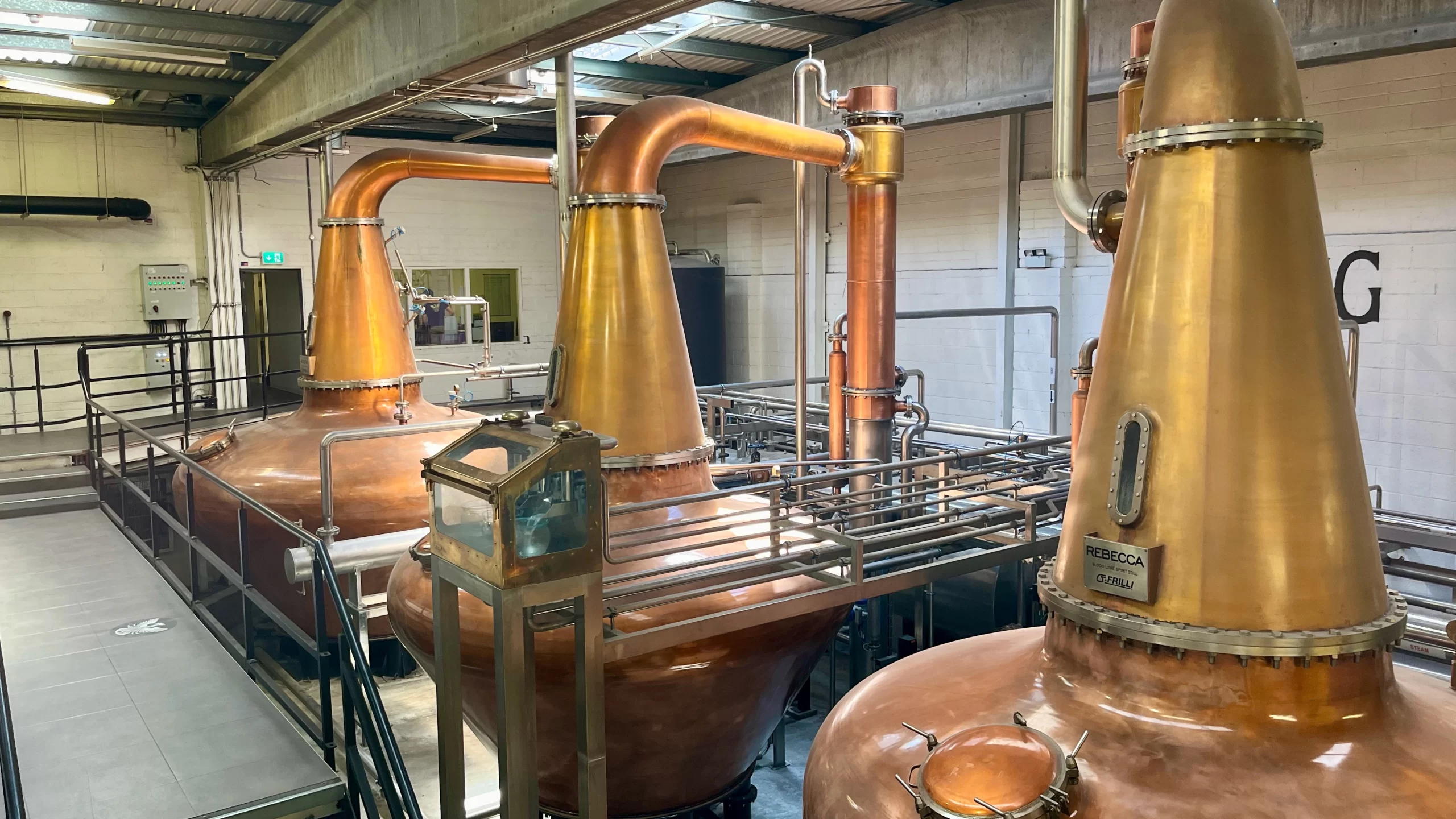 3 large copper pot stills at teeling distillery in Dublin Ireland