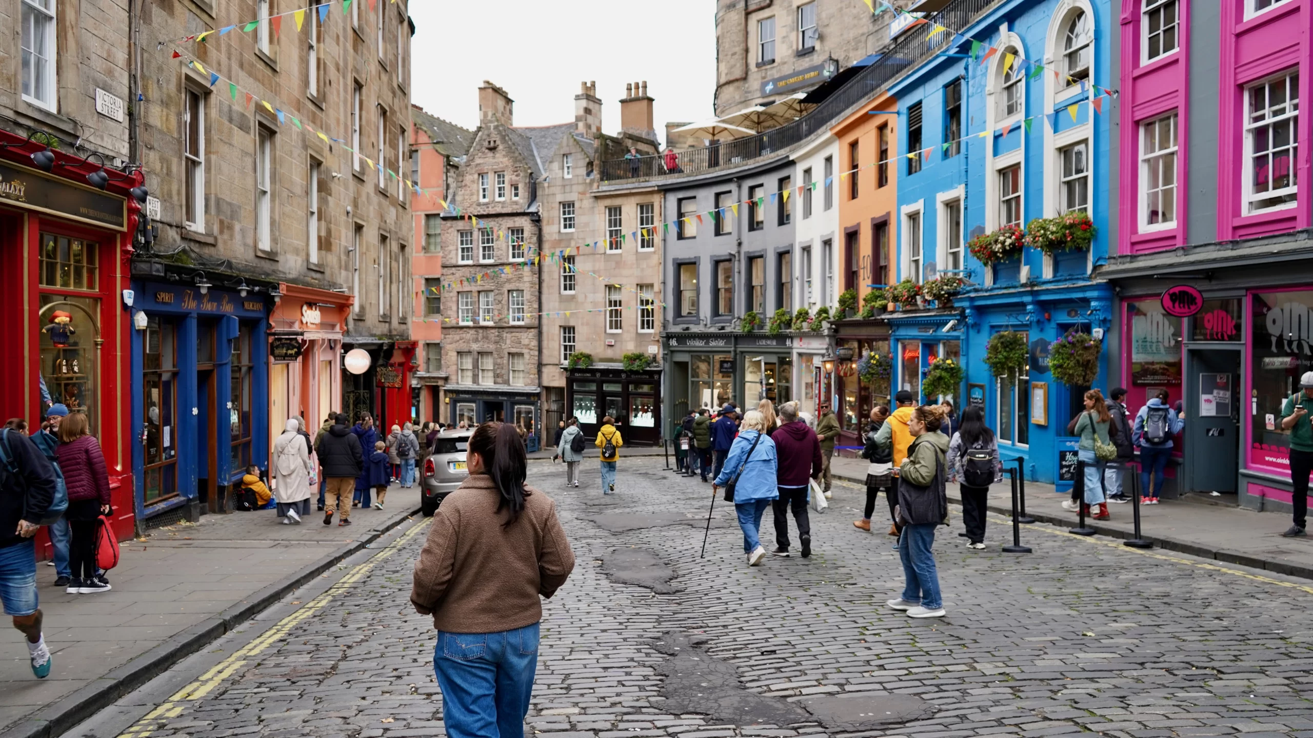 colorful buildings along a cobblestone Victoria street